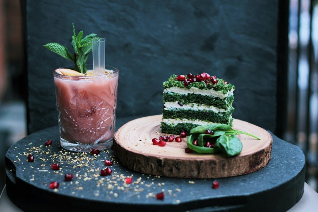 Spinach cake on a wood plate